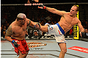 LAS VEGAS, NV - MAY 25:   (R-L) Junior dos Santos kicks Mark Hunt in their heavyweight bout during UFC 160 at the MGM Grand Garden Arena on May 25, 2013 in Las Vegas, Nevada.  (Photo by Donald Miralle/Zuffa LLC/Zuffa LLC via Getty Images)  *** Local Caption *** Junior dos Santos; Mark Hunt