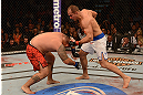 LAS VEGAS, NV - MAY 25:   (R-L) Junior dos Santos punches Mark Hunt in their heavyweight bout during UFC 160 at the MGM Grand Garden Arena on May 25, 2013 in Las Vegas, Nevada.  (Photo by Donald Miralle/Zuffa LLC/Zuffa LLC via Getty Images)  *** Local Caption *** Junior dos Santos; Mark Hunt