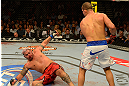 LAS VEGAS, NV - MAY 25:   (R-L) Junior dos Santos reacts to knocking down Mark Hunt in their heavyweight bout during UFC 160 at the MGM Grand Garden Arena on May 25, 2013 in Las Vegas, Nevada.  (Photo by Donald Miralle/Zuffa LLC/Zuffa LLC via Getty Images)  *** Local Caption *** Junior dos Santos; Mark Hunt