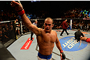 LAS VEGAS, NV - MAY 25:   Junior dos Santos reacts to his knockout victory over Mark Hunt in their heavyweight bout during UFC 160 at the MGM Grand Garden Arena on May 25, 2013 in Las Vegas, Nevada.  (Photo by Donald Miralle/Zuffa LLC/Zuffa LLC via Getty Images)  *** Local Caption *** Junior dos Santos; Mark Hunt