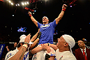 LAS VEGAS, NV - MAY 25:   Junior dos Santos reacts to his victory over Mark Hunt in their heavyweight bout during UFC 160 at the MGM Grand Garden Arena on May 25, 2013 in Las Vegas, Nevada.  (Photo by Donald Miralle/Zuffa LLC/Zuffa LLC via Getty Images)  *** Local Caption *** Junior dos Santos; Mark Hunt