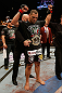 LAS VEGAS, NV - MAY 25:   Cain Velasquez has the UFC championship belt placed around his waist during UFC 160 at the MGM Grand Garden Arena on May 25, 2013 in Las Vegas, Nevada.  (Photo by Josh Hedges/Zuffa LLC/Zuffa LLC via Getty Images)  *** Local Caption *** Cain Velasquez; Antonio Silva