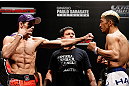 FORTALEZA, BRAZIL - JUNE 07:  (L-R) Opponents Rodrigo Damm and Mizuto Hirota during the UFC weigh-in at Paulo Sarasate Arena on June 7, 2013 in Fortaleza, Ceara, Brazil.  (Photo by Josh Hedges/Zuffa LLC/Zuffa LLC via Getty Images)