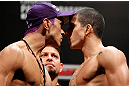 FORTALEZA, BRAZIL - JUNE 07:  (L-R) Opponents Godofredo "Pepey" Castro and Felipe Arantes face off during the UFC weigh-in at Paulo Sarasate Arena on June 7, 2013 in Fortaleza, Ceara, Brazil.  (Photo by Josh Hedges/Zuffa LLC/Zuffa LLC via Getty Images)