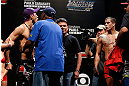 FORTALEZA, BRAZIL - JUNE 07:  (L-R) Opponents Godofredo "Pepey" Castro and Felipe Arantes are separated after a heated face off during the UFC weigh-in at Paulo Sarasate Arena on June 7, 2013 in Fortaleza, Ceara, Brazil.  (Photo by Josh Hedges/Zuffa LLC/Zuffa LLC via Getty Images)