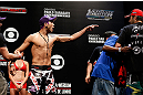 FORTALEZA, BRAZIL - JUNE 07:  (L-R) Opponents Godofredo "Pepey" Castro and Felipe Arantes are separated after a heated face off during the UFC weigh-in at Paulo Sarasate Arena on June 7, 2013 in Fortaleza, Ceara, Brazil.  (Photo by Josh Hedges/Zuffa LLC/Zuffa LLC via Getty Images)