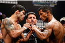 FORTALEZA, BRAZIL - JUNE 07:  (L-R) Opponents Raphael Assuncao and Vaughan Lee face off during the UFC weigh-in at Paulo Sarasate Arena on June 7, 2013 in Fortaleza, Ceara, Brazil.  (Photo by Josh Hedges/Zuffa LLC/Zuffa LLC via Getty Images)