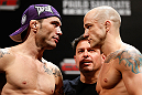 FORTALEZA, BRAZIL - JUNE 07:  (L-R) Opponents Rony "Jason" Mariano Bezerra and Mike Wilkinson face off during the UFC weigh-in at Paulo Sarasate Arena on June 7, 2013 in Fortaleza, Ceara, Brazil.  (Photo by Josh Hedges/Zuffa LLC/Zuffa LLC via Getty Images)