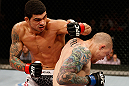 FORTALEZA, BRAZIL - JUNE 08:  (L-R) Antonio Braga Neto punches Anthony Smith in their middleweight fight during the UFC on FUEL TV event at Paulo Sarasate Arena on June 8, 2013 in Fortaleza, Ceara, Brazil.  (Photo by Josh Hedges/Zuffa LLC/Zuffa LLC via Getty Images)