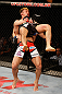 FORTALEZA, BRAZIL - JUNE 08:  Rodrigo Damm suplexes Mizuto Hirota in their featherweight fight during the UFC on FUEL TV event at Paulo Sarasate Arena on June 8, 2013 in Fortaleza, Ceara, Brazil.  (Photo by Josh Hedges/Zuffa LLC/Zuffa LLC via Getty Images)