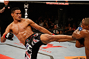 FORTALEZA, BRAZIL - JUNE 08:  (L-R) Ildemar Alcantara kicks Leandro Silva in their welterweight fight during the UFC on FUEL TV event at Paulo Sarasate Arena on June 8, 2013 in Fortaleza, Ceara, Brazil.  (Photo by Josh Hedges/Zuffa LLC/Zuffa LLC via Getty Images)