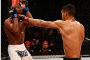 FORTALEZA, BRAZIL - JUNE 08:  (R-L) Ildemar Alcantara punches Leandro Silva in their welterweight fight during the UFC on FUEL TV event at Paulo Sarasate Arena on June 8, 2013 in Fortaleza, Ceara, Brazil.  (Photo by Josh Hedges/Zuffa LLC/Zuffa LLC via Getty Images)