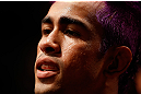 FORTALEZA, BRAZIL - JUNE 08:  (L-R) Godofredo "Pepey" Castro prepares to enter the Octagon before his featherweight fight against Felipe Arantes during the UFC on FUEL TV event at Paulo Sarasate Arena on June 8, 2013 in Fortaleza, Ceara, Brazil.  (Photo by Josh Hedges/Zuffa LLC/Zuffa LLC via Getty Images)