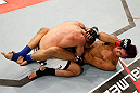 FORTALEZA, BRAZIL - JUNE 08:  (R-L) Godofredo "Pepey" Castro elbows Felipe Arantes in their featherweight fight during the UFC on FUEL TV event at Paulo Sarasate Arena on June 8, 2013 in Fortaleza, Ceara, Brazil.  (Photo by Josh Hedges/Zuffa LLC/Zuffa LLC via Getty Images)