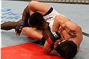 FORTALEZA, BRAZIL - JUNE 08:  (R-L) Erick Silva secures an arm bar submission against Jason High in their welterweight fight during the UFC on FUEL TV event at Paulo Sarasate Arena on June 8, 2013 in Fortaleza, Ceara, Brazil.  (Photo by Josh Hedges/Zuffa LLC/Zuffa LLC via Getty Images)