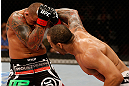 FORTALEZA, BRAZIL - JUNE 08:  (R-L) Rafael "Feijao" Cavalcante punches Thiago Silva in their light heavyweight fight during the UFC on FUEL TV event at Paulo Sarasate Arena on June 8, 2013 in Fortaleza, Ceara, Brazil.  (Photo by Josh Hedges/Zuffa LLC/Zuffa LLC via Getty Images)