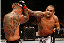 FORTALEZA, BRAZIL - JUNE 08:  (R-L) Rafael "Feijao" Cavalcante punches Thiago Silva in their light heavyweight fight during the UFC on FUEL TV event at Paulo Sarasate Arena on June 8, 2013 in Fortaleza, Ceara, Brazil.  (Photo by Josh Hedges/Zuffa LLC/Zuffa LLC via Getty Images)