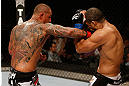FORTALEZA, BRAZIL - JUNE 08:  (L-R) Thiago Silva punches Rafael "Feijao" Cavalcante in their light heavyweight fight during the UFC on FUEL TV event at Paulo Sarasate Arena on June 8, 2013 in Fortaleza, Ceara, Brazil.  (Photo by Josh Hedges/Zuffa LLC/Zuffa LLC via Getty Images)
