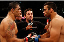 FORTALEZA, BRAZIL - JUNE 08:  (L-R) Opponents Antonio Rodrigo "Minotauro" Nogueira and Fabricio Werdum face off before their heavyweight fight during the UFC on FUEL TV event at Paulo Sarasate Arena on June 8, 2013 in Fortaleza, Ceara, Brazil.  (Photo by Josh Hedges/Zuffa LLC/Zuffa LLC via Getty Images)
