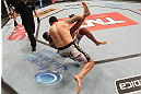 FORTALEZA, BRAZIL - JUNE 08:  (L-R) Fabricio Werdum takes down Antonio Rodrigo "Minotauro" Nogueira in their heavyweight fight during the UFC on FUEL TV event at Paulo Sarasate Arena on June 8, 2013 in Fortaleza, Ceara, Brazil.  (Photo by Josh Hedges/Zuffa LLC/Zuffa LLC via Getty Images)