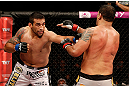 FORTALEZA, BRAZIL - JUNE 08:  (L-R) Fabricio Werdum punches Antonio Rodrigo "Minotauro" Nogueira in their heavyweight fight during the UFC on FUEL TV event at Paulo Sarasate Arena on June 8, 2013 in Fortaleza, Ceara, Brazil.  (Photo by Josh Hedges/Zuffa LLC/Zuffa LLC via Getty Images)