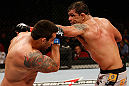 FORTALEZA, BRAZIL - JUNE 08:  (R-L) Antonio Rodrigo "Minotauro" Nogueira punches Fabricio Werdum in their heavyweight fight during the UFC on FUEL TV event at Paulo Sarasate Arena on June 8, 2013 in Fortaleza, Ceara, Brazil.  (Photo by Josh Hedges/Zuffa LLC/Zuffa LLC via Getty Images)