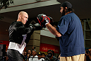 WINNIPEG, CANADA - JUNE 12:  (L-R) Sean Pierson works out with former CFL football player Obby Khan during an open workout session for fans and media at Portage Place on June 12, 2013 in Winnipeg, Manitoba, Canada.  (Photo by Josh Hedges/Zuffa LLC/Zuffa LLC via Getty Images)