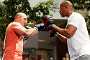WINNIPEG, CANADA - JUNE 12:  (L-R) Shawn Jordan works out with former CFL football player Lamar McGriggs during an open workout session for fans and media at Portage Place on June 12, 2013 in Winnipeg, Manitoba, Canada.  (Photo by Josh Hedges/Zuffa LLC/Zuffa LLC via Getty Images)