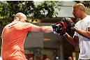 WINNIPEG, CANADA - JUNE 12:  (L-R) Shawn Jordan works out with former CFL football player Lamar McGriggs during an open workout session for fans and media at Portage Place on June 12, 2013 in Winnipeg, Manitoba, Canada.  (Photo by Josh Hedges/Zuffa LLC/Zuffa LLC via Getty Images)