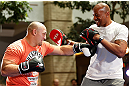 WINNIPEG, CANADA - JUNE 12:  (L-R) Shawn Jordan works out with former CFL football player Lamar McGriggs during an open workout session for fans and media at Portage Place on June 12, 2013 in Winnipeg, Manitoba, Canada.  (Photo by Josh Hedges/Zuffa LLC/Zuffa LLC via Getty Images)