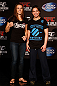 WINNIPEG, CANADA - JUNE 13:  (L-R) Opponents Alexis Davis and Rosi Sexton pose for photos during the UFC 161 media day at The Met on June 13, 2013 in Winnipeg, Manitoba, Canada.  (Photo by Josh Hedges/Zuffa LLC/Zuffa LLC via Getty Images)