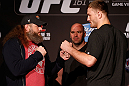 WINNIPEG, CANADA - JUNE 13:  (L-R) Opponents Roy Nelson and Stipe Miocic face off during the UFC 161 media day at The Met on June 13, 2013 in Winnipeg, Manitoba, Canada.  (Photo by Josh Hedges/Zuffa LLC/Zuffa LLC via Getty Images)