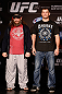 WINNIPEG, CANADA - JUNE 13:  (L-R) Opponents Roy Nelson and Stipe Miocic pose for photos during the UFC 161 media day at The Met on June 13, 2013 in Winnipeg, Manitoba, Canada.  (Photo by Josh Hedges/Zuffa LLC/Zuffa LLC via Getty Images)