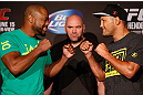 WINNIPEG, CANADA - JUNE 13:  (L-R) Opponents Rashad Evans and Dan Henderson face off during the UFC 161 media day at The Met on June 13, 2013 in Winnipeg, Manitoba, Canada.  (Photo by Josh Hedges/Zuffa LLC/Zuffa LLC via Getty Images)