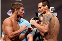 WINNIPEG, CANADA - JUNE 14:  (L-R) Opponents Sam Stout and James Krause face off during the UFC 161 weigh-in at the MTS Centre on June 14, 2013 in Winnipeg, Manitoba, Canada.  (Photo by Josh Hedges/Zuffa LLC/Zuffa LLC via Getty Images)