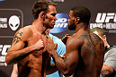 WINNIPEG, CANADA - JUNE 14:  (L-R) Opponents Jake Shields and Tyron Woodley face off during the UFC 161 weigh-in at the MTS Centre on June 14, 2013 in Winnipeg, Manitoba, Canada.  (Photo by Josh Hedges/Zuffa LLC/Zuffa LLC via Getty Images)