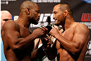 WINNIPEG, CANADA - JUNE 14:  (L-R) Opponents Rashad Evans and Dan Henderson face off during the UFC 161 weigh-in at the MTS Centre on June 14, 2013 in Winnipeg, Manitoba, Canada.  (Photo by Josh Hedges/Zuffa LLC/Zuffa LLC via Getty Images)