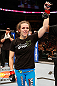 WINNIPEG, CANADA - JUNE 15:  Alexis Davis reacts after defeating Rosi Sexton in their bantamweight fight during the UFC 161 event at the MTS Centre on June 15, 2013 in Winnipeg, Manitoba, Canada.  (Photo by Josh Hedges/Zuffa LLC/Zuffa LLC via Getty Images)