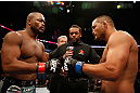 WINNIPEG, CANADA - JUNE 15:  (L-R) Opponents Rashad Evans and Dan Henderson touch gloves before their light heavyweight fight during the UFC 161 event at the MTS Centre on June 15, 2013 in Winnipeg, Manitoba, Canada.  (Photo by Josh Hedges/Zuffa LLC/Zuffa LLC via Getty Images)