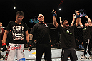 UFC 130: Demetrious Johnson celebrates his win