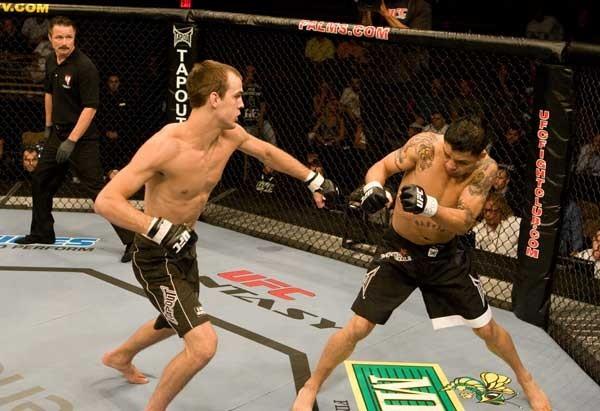 Miller delivers a blow to Leonard Garcia Miller delivers a blow to Leonard Garcia