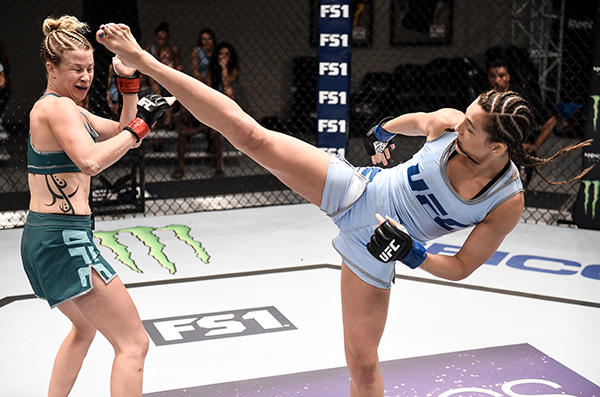 Montana Stewart kicks Ariel Beck during her opening round fight in The Ultimate Fighter