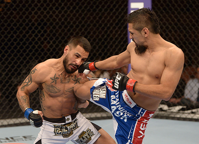 LAS VEGAS, NV - FEBRUARY 02:  (R-L) Edwin Figueroa kicks Francisco Rivera during their bantamweight fight at UFC 156 on February 2, 2013 at the Mandalay Bay Events Center in Las Vegas, Nevada.  (Photo by Donald Miralle/Zuffa LLC/Zuffa LLC via Getty Images) *** Local Caption *** Francisco Rivera; Edwin Figueroa