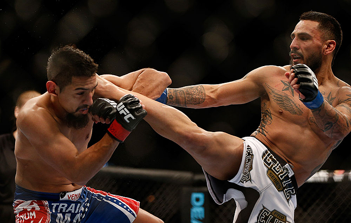 LAS VEGAS, NV - FEBRUARY 02: (R-L) Francisco Rivera kicks Edwin Figueroa during their bantamweight fight at UFC 156 on February 2, 2013 at the Mandalay Bay Events Center in Las Vegas, Nevada. (Photo by Josh Hedges/Zuffa LLC/Zuffa LLC via Getty Images) *** Local Caption *** Francisco Rivera; Edwin Figueroa