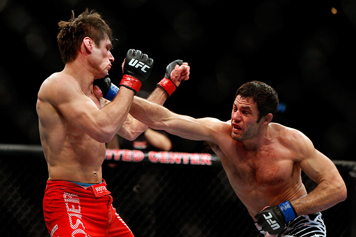 CHICAGO, IL - JANUARY 26:  David Mitchell (L) punches Simeon Thoresen (R) during their Welterweight Bout part of Facebook Prelims at United Center on January 26, 2013 in Chicago, Illinois.  (Photo by Josh Hedges/Zuffa LLC/Zuffa LLC Via Getty Images)
