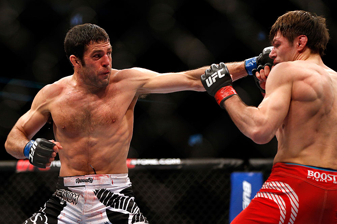 CHICAGO, IL - JANUARY 26:  David Mitchell (L) punches Simeon Thoresen (R) during their Welterweight Bout part of Facebook Prelims at United Center on January 26, 2013 in Chicago, Illinois.  (Photo by Josh Hedges/Zuffa LLC/Zuffa LLC Via Getty Images)