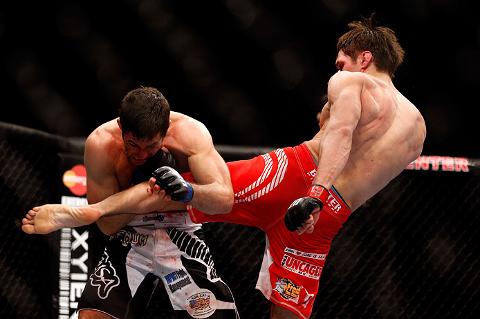 CHICAGO, IL - JANUARY 26:  David Mitchell (L) gets kicked by Simeon Thoresen (R) during their Welterweight Bout part of Facebook Prelims at United Center on January 26, 2013 in Chicago, Illinois.  (Photo by Josh Hedges/Zuffa LLC/Zuffa LLC Via Getty Images)