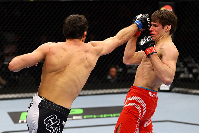 CHICAGO, IL - JANUARY 26:  David Mitchell (L) punches Simeon Thoresen (R) during their Welterweight Bout part of Facebook Prelims at United Center on January 26, 2013 in Chicago, Illinois.  (Photo by Al Bello/Zuffa LLC/Zuffa LLC Via Getty Images)