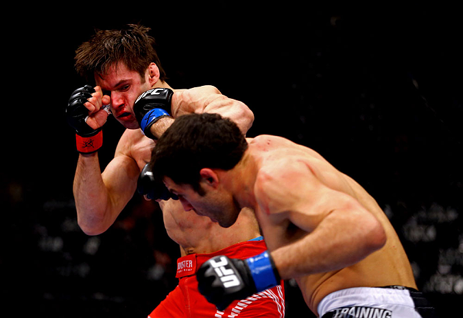 CHICAGO, IL - JANUARY 26:  David Mitchell (Front) punches Simeon Thoresen (Back) during their Welterweight Bout part of Facebook Prelims at United Center on January 26, 2013 in Chicago, Illinois.  (Photo by Al Bello/Zuffa LLC/Zuffa LLC Via Getty Images)