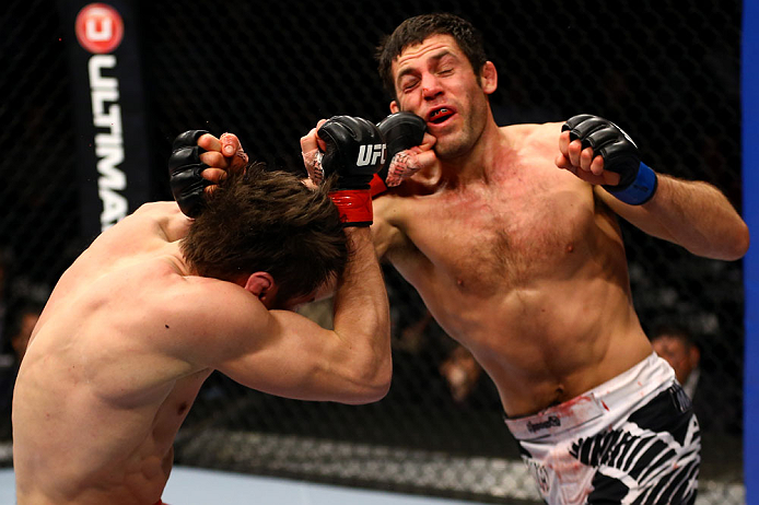 CHICAGO, IL - JANUARY 26:  David Mitchell (L) gets punched by Simeon Thoresen (R) during their Welterweight Bout part of Facebook Prelims at United Center on January 26, 2013 in Chicago, Illinois.  (Photo by Al Bello/Zuffa LLC/Zuffa LLC Via Getty Images)